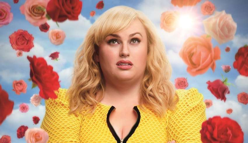Poster image featuring Rebel Wilson for Warner Bros. Pictures' ISN'T IT ROMANTIC