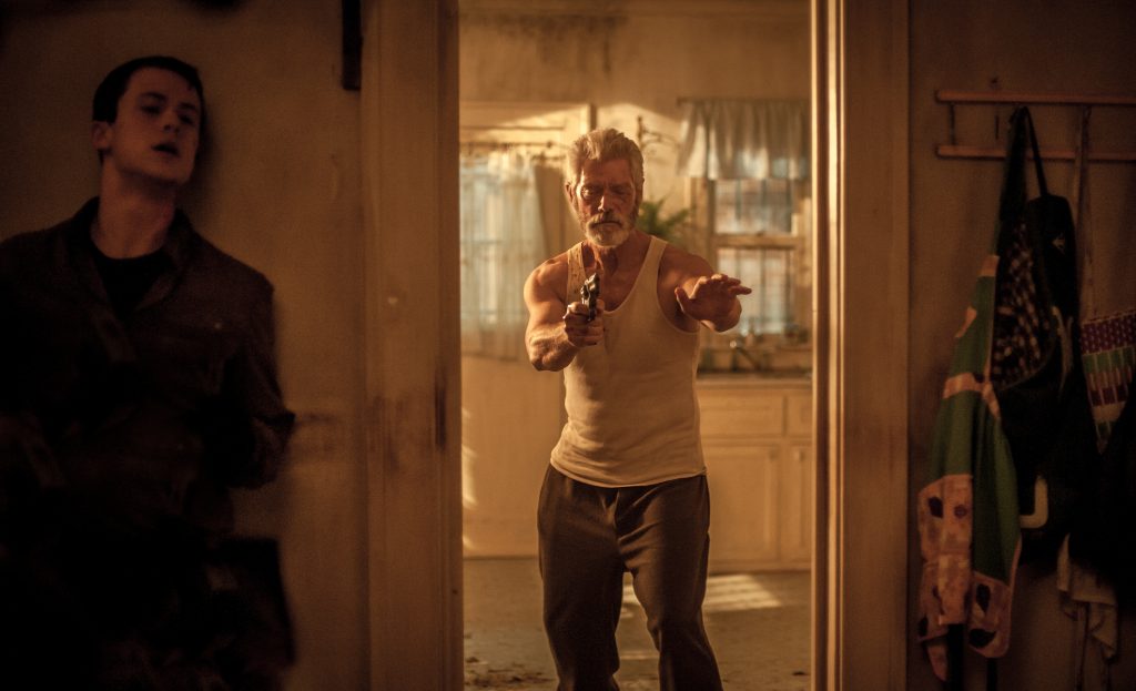 Dylan Minnette and Stephen Lang star in Screen Gems' DONT BREATHE